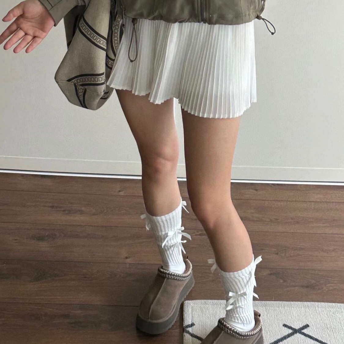 tazz 스노우 부츠 여성 2025 겨울 신상품 통솔 슬리퍼 위에 토트백을 신고 두꺼운 면화를 질질 끌어 미끄럼 방지