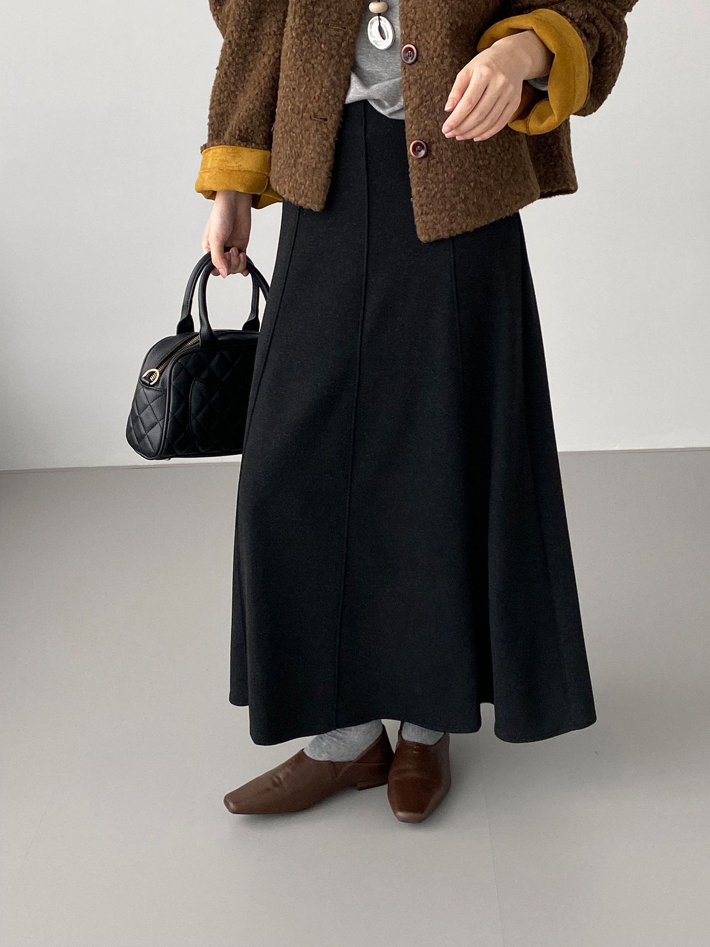 한식 통근 분위기의 시크한 짜임새 스커트예요, 여자 허리 밴딩 a 자로 날씬해 보이는 롱스커트예요